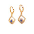 A pair of Blue Evil Eye Zirconia stones Dangle huggies Earrings Rose gold filled with diamonds.